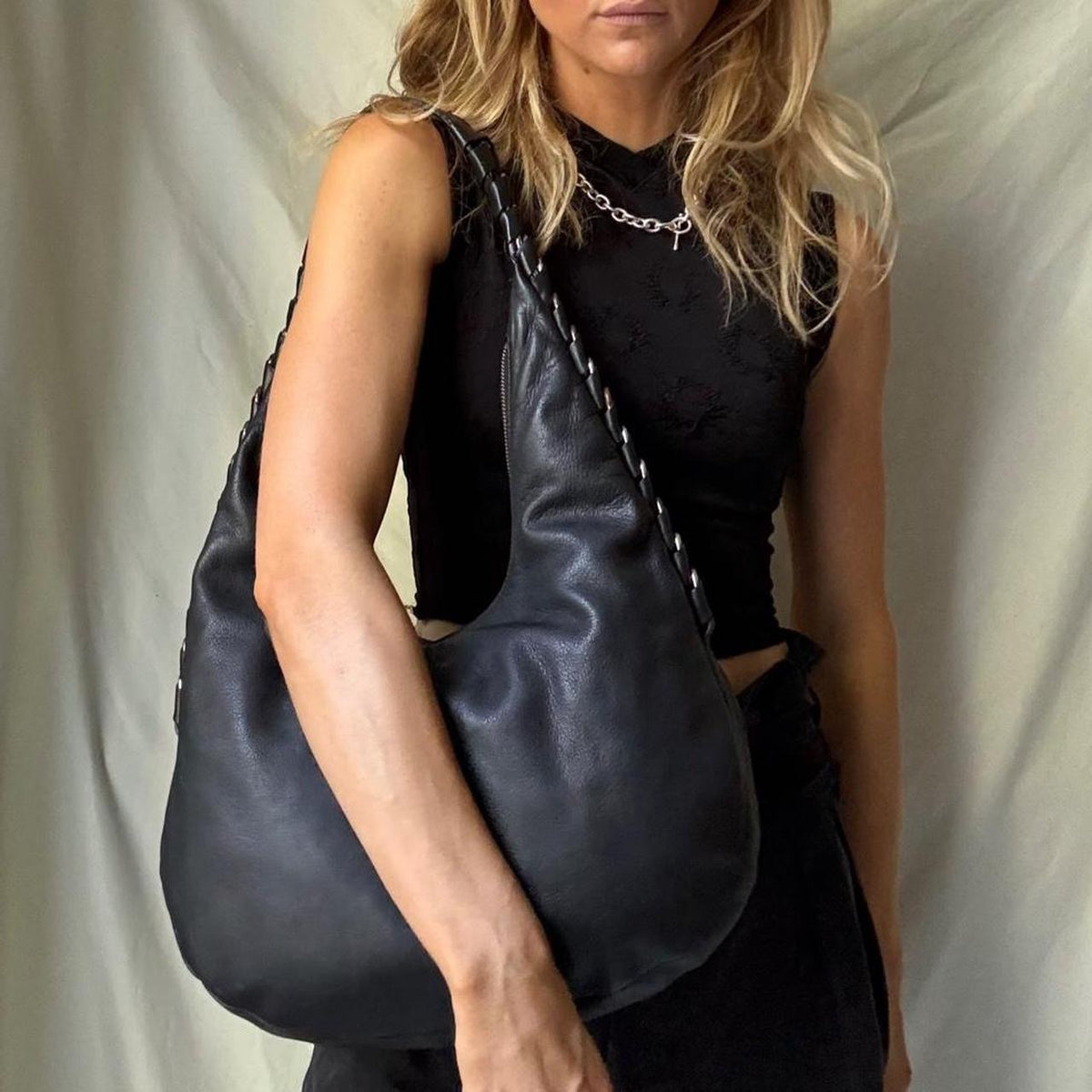 Sculptural Vintage Leather Hobo Bag With Hardware Spine