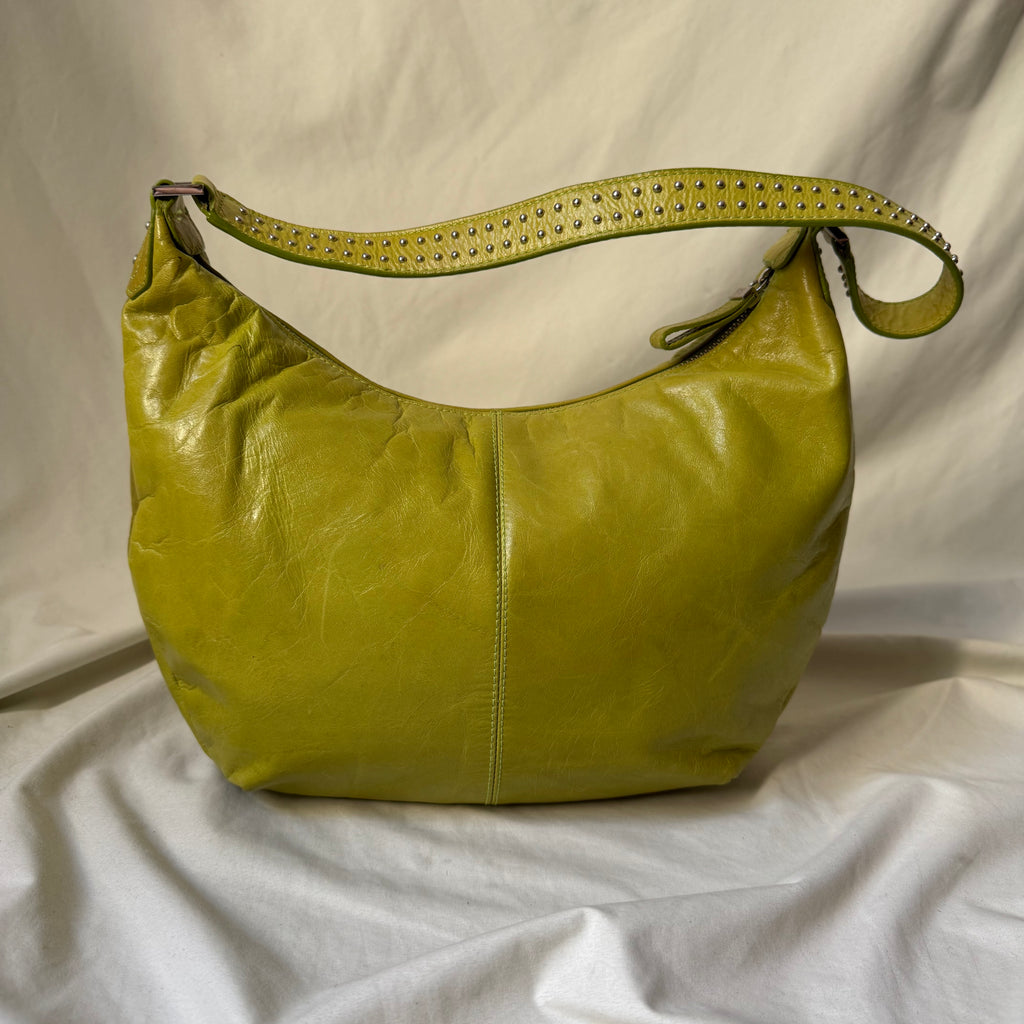 Y2K vintage bright lime green leather rounded, curved hobo bag with decorative studs along the strap 